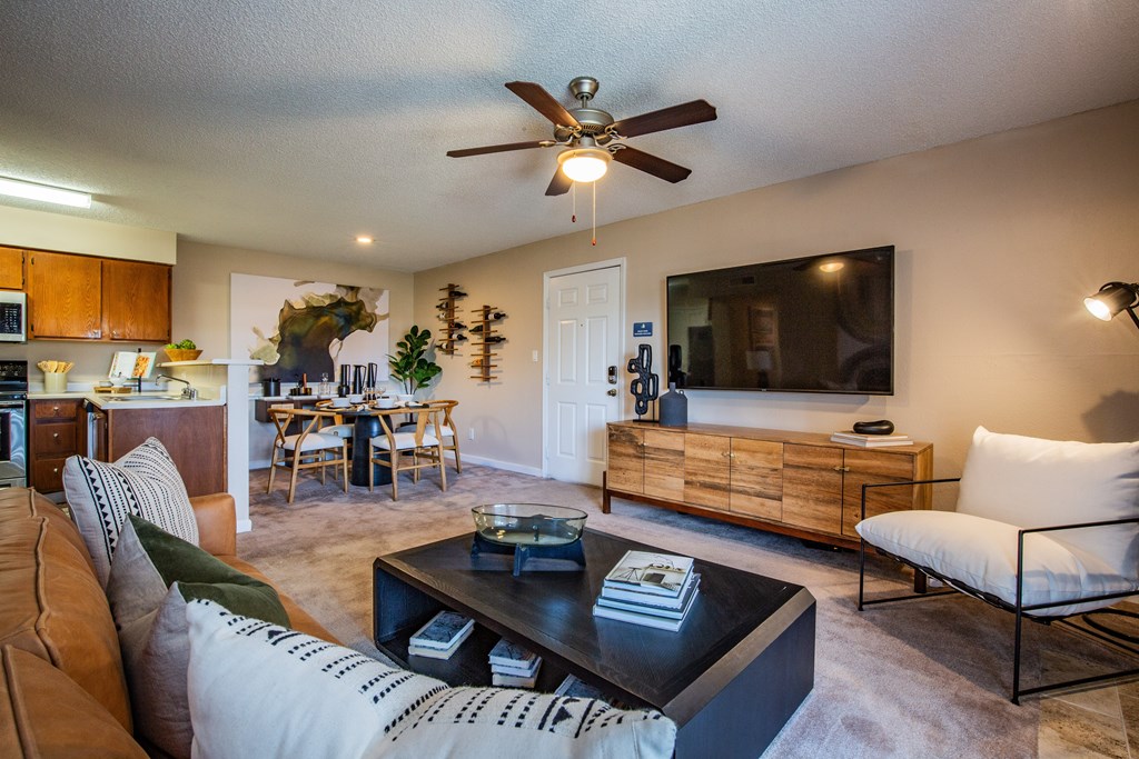 Large Living Room with Ceiling Fan at Apartment Home in Albuquerque